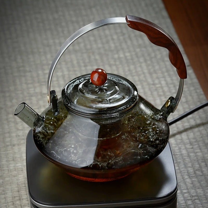 Tea pot with a handle