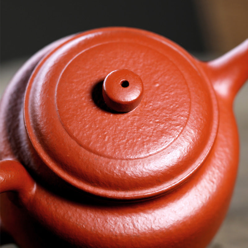 Handmade pear skin vermilion clay De Zhong teapot