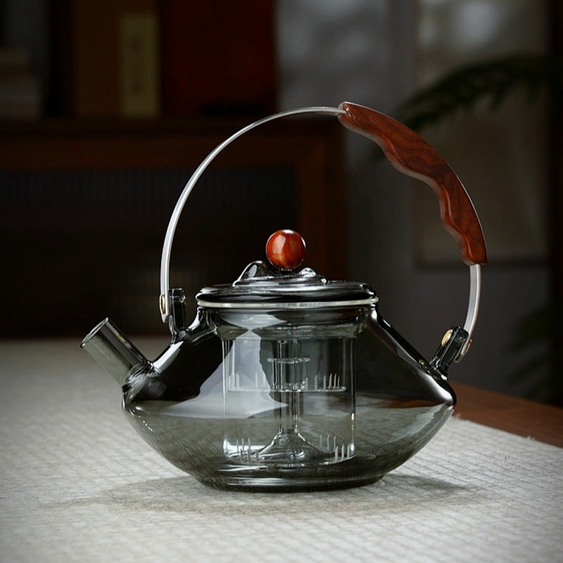 Tea pot with a handle